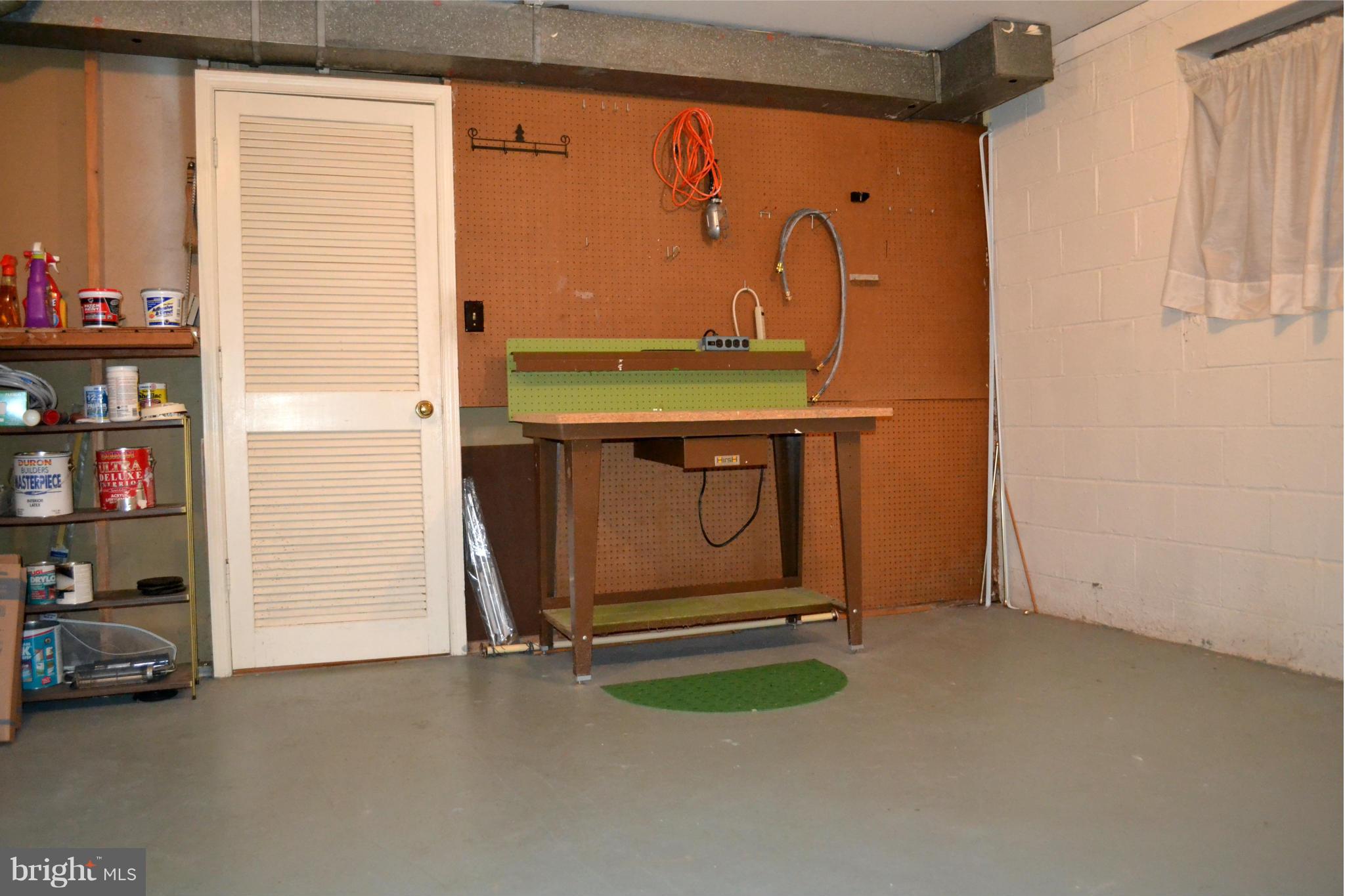 8256 Carrleigh Parkway Springfield, VA 22152 - Photo 27 of 28 a room with window and a table