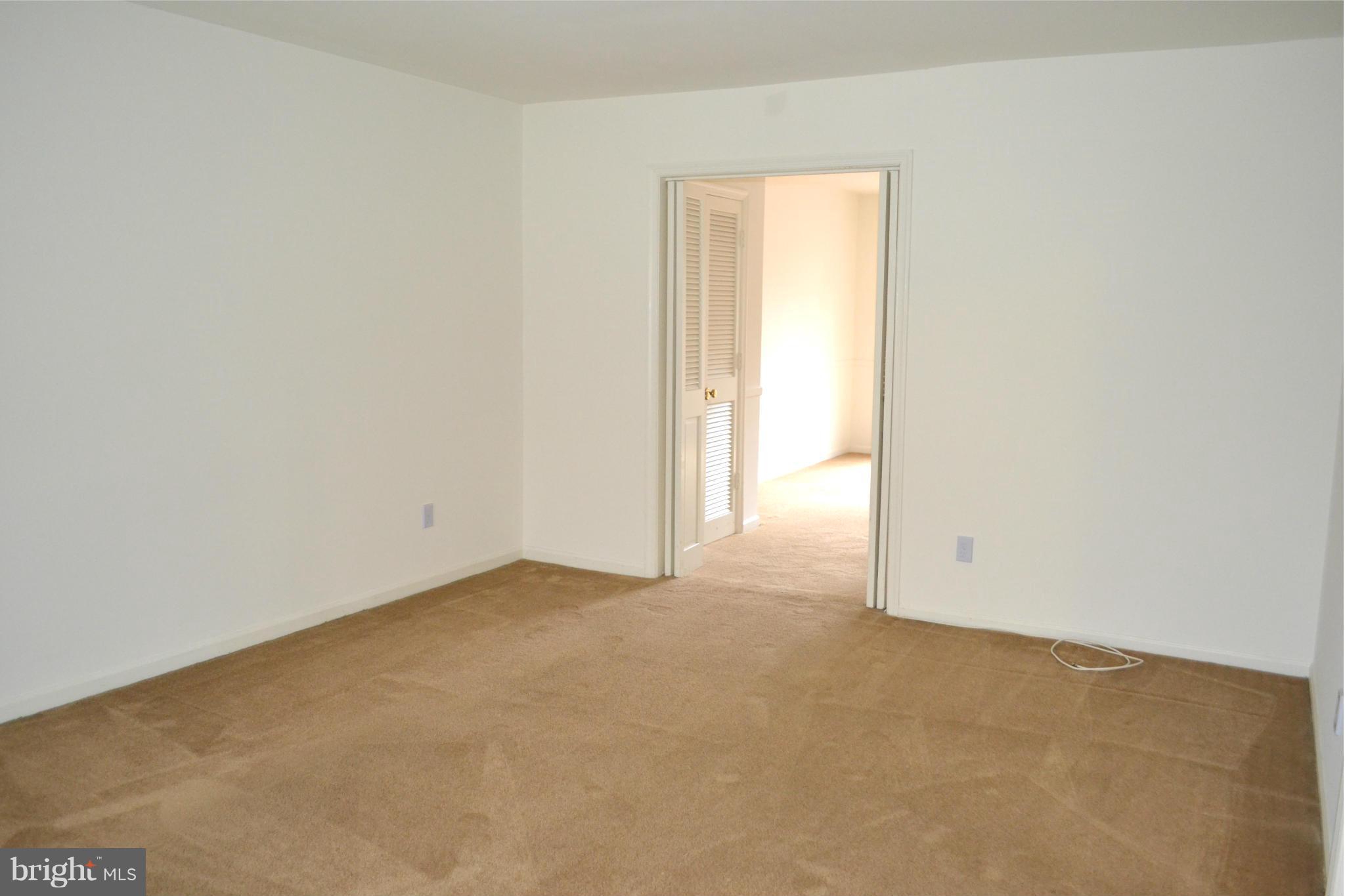 8256 Carrleigh Parkway Springfield, VA 22152 - Photo 6 of 28 a view of an empty room