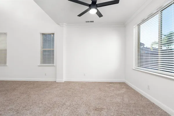 a view of a bathroom with a shower and a sink