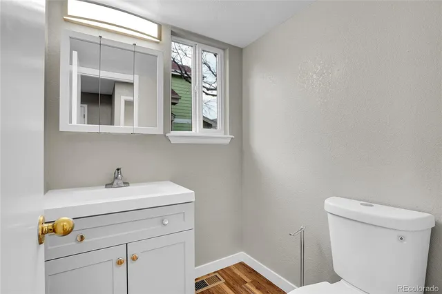 a bathroom with a sink and a toilet