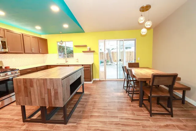 a view of a backyard of the house