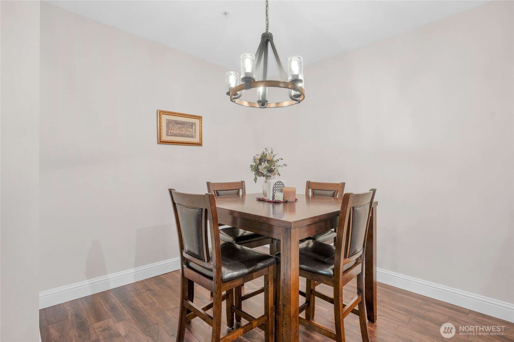 15300 112th Avenue Northeast, Unit A304 Bothell, WA 98011 - Photo 11 of 28 a dining room with a table and chairs