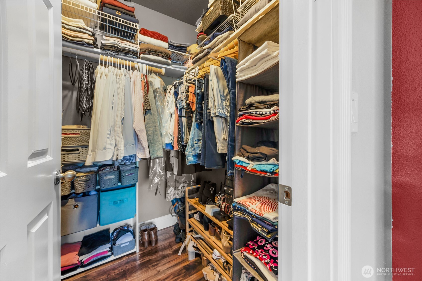 15300 112th Avenue Northeast, Unit A304 Bothell, WA 98011 - Photo 16 of 28 a view of walk in closet with clothes and shoes