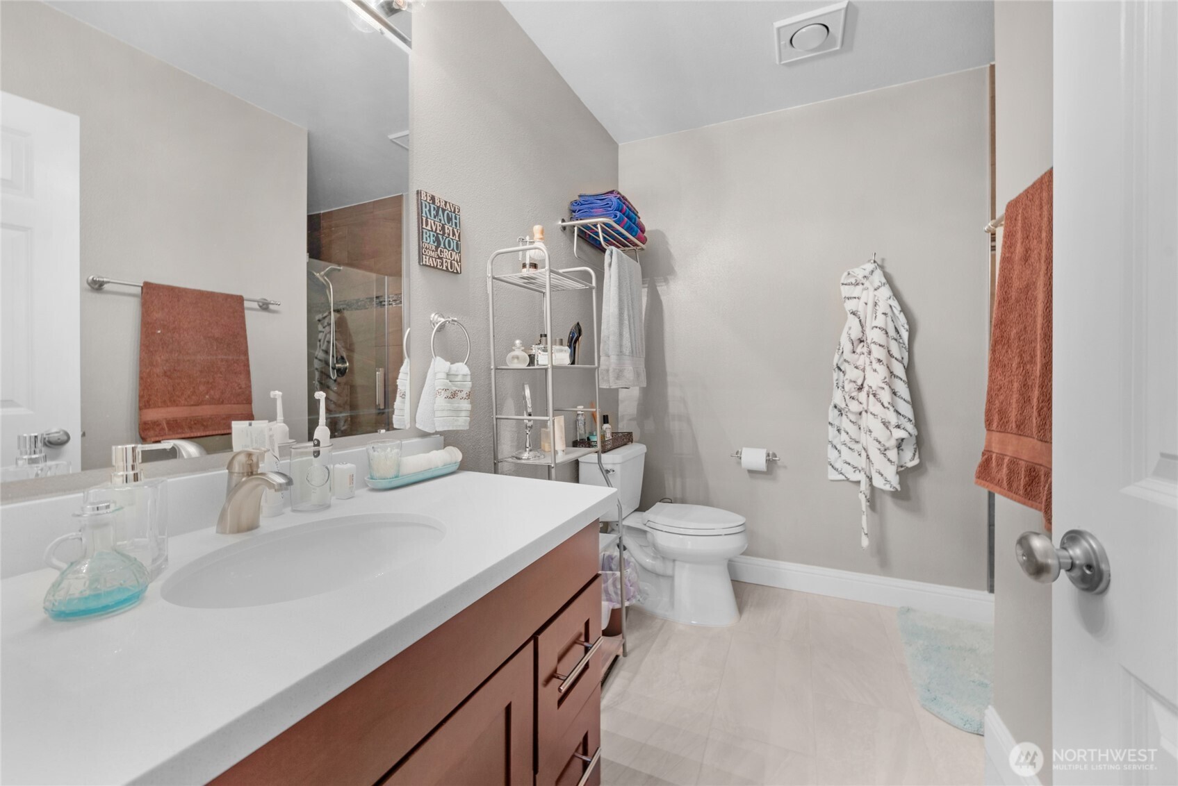 15300 112th Avenue Northeast, Unit A304 Bothell, WA 98011 - Photo 17 of 28 a bathroom with a sink toilet and shower