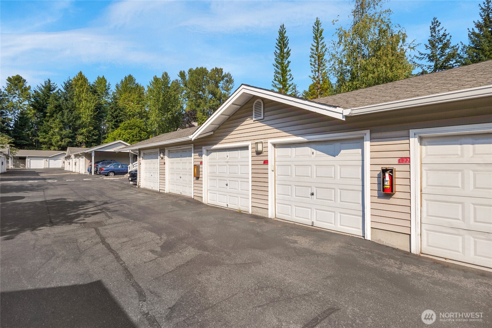 15300 112th Avenue Northeast, Unit A304 Bothell, WA 98011 - Photo 25 of 28 a view of a house with a garage