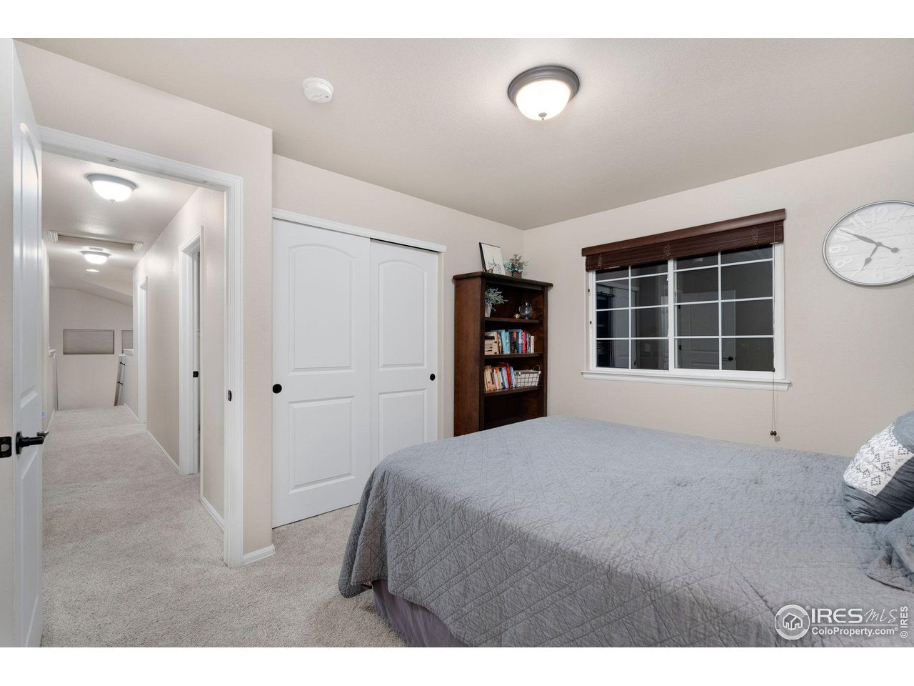 7334 23rd St Road Greeley, CO 80634 - Photo 24 of 31 a bedroom with a bed and a window