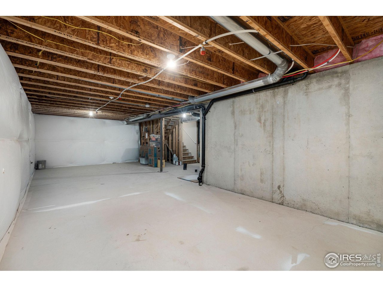 7334 23rd St Road Greeley, CO 80634 - Photo 27 of 31 a view of a room with wooden walls