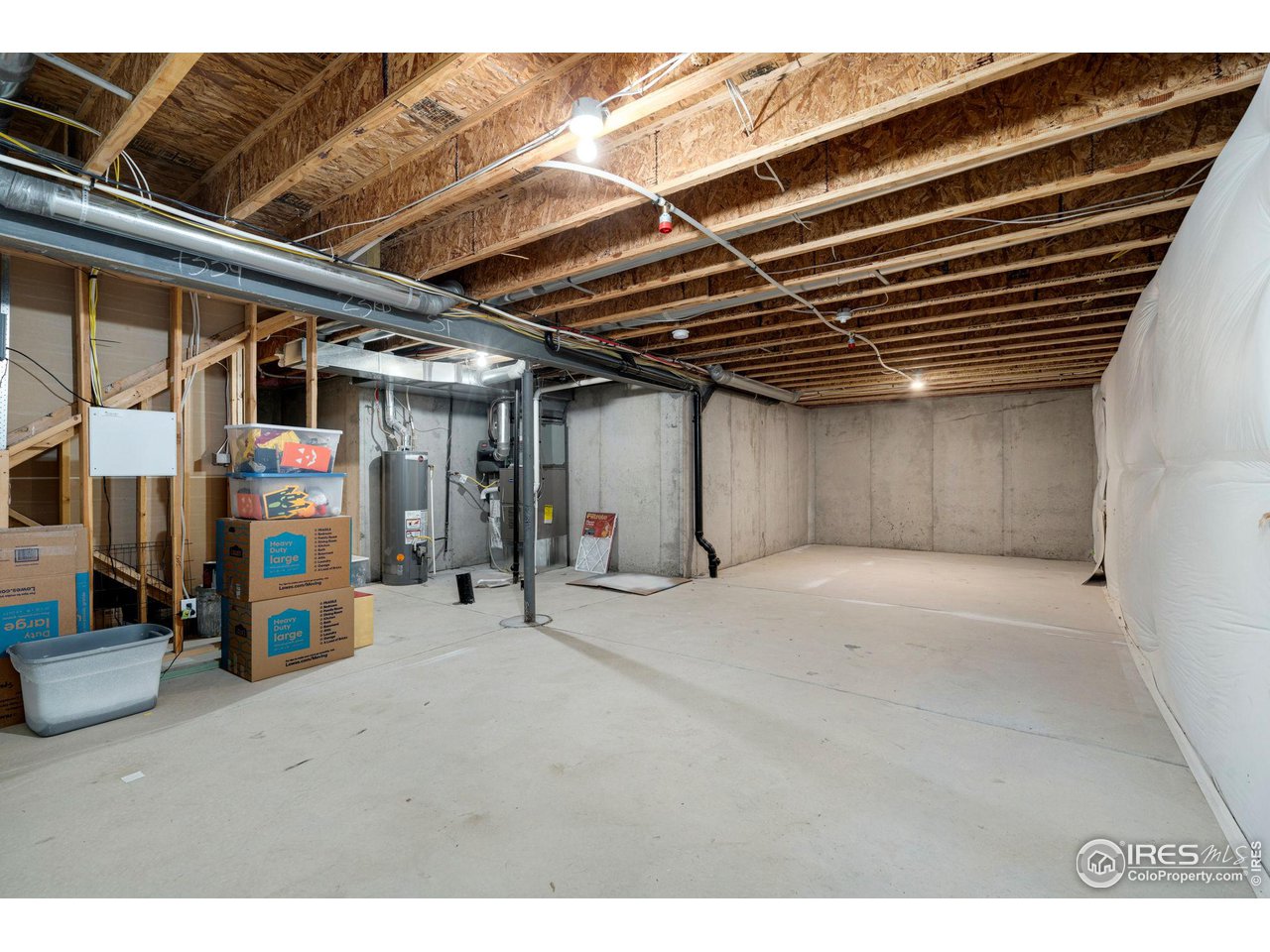 7334 23rd St Road Greeley, CO 80634 - Photo 28 of 31 a view of empty room with wooden floor