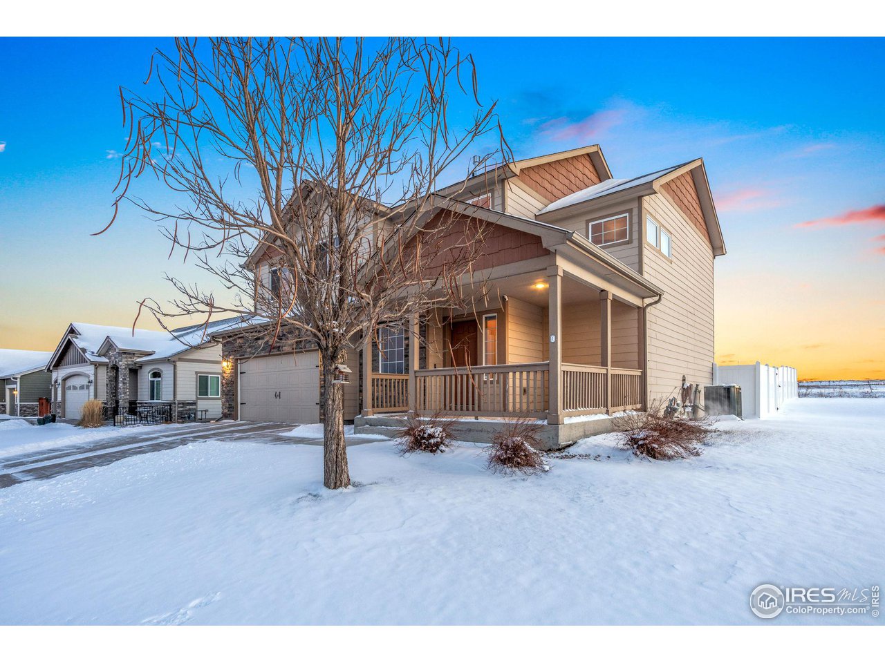 7334 23rd St Road Greeley, CO 80634 - Photo 3 of 31 a backyard of a house with table and chairs