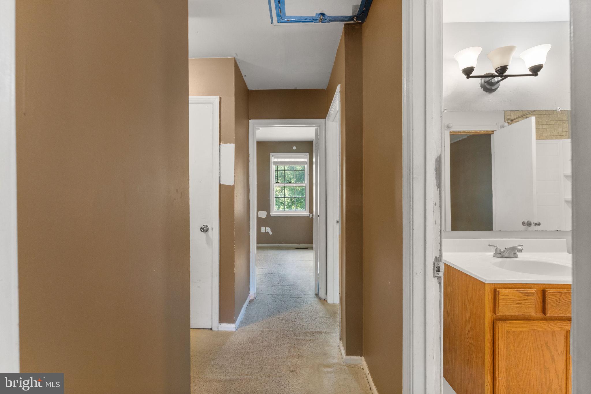 14489 Golden Oak Road Centreville, VA 20121 - Photo 11 of 27 a en suite bathroom with a sink and a mirror