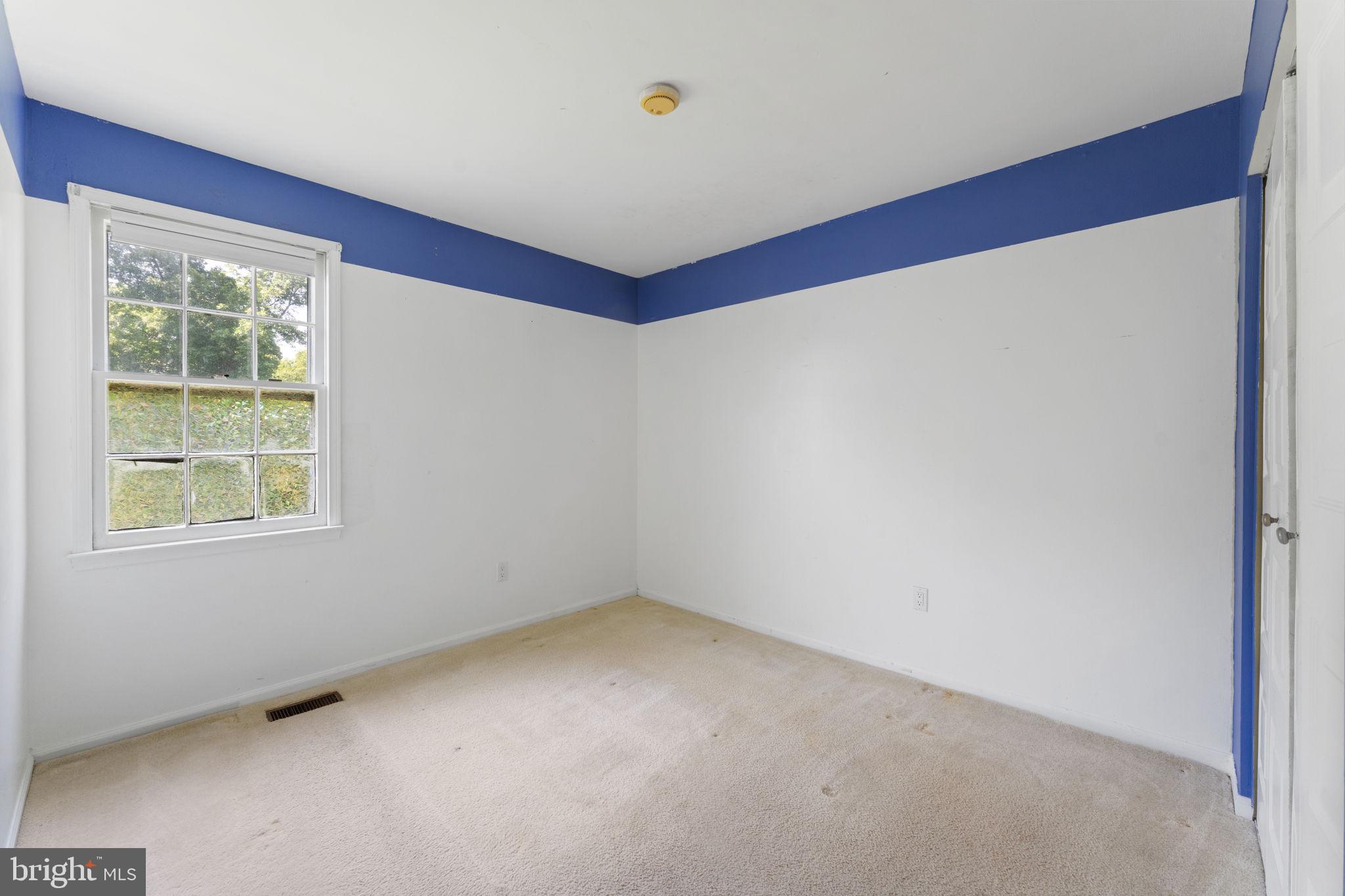14489 Golden Oak Road Centreville, VA 20121 - Photo 13 of 27 a view of an empty room with a window