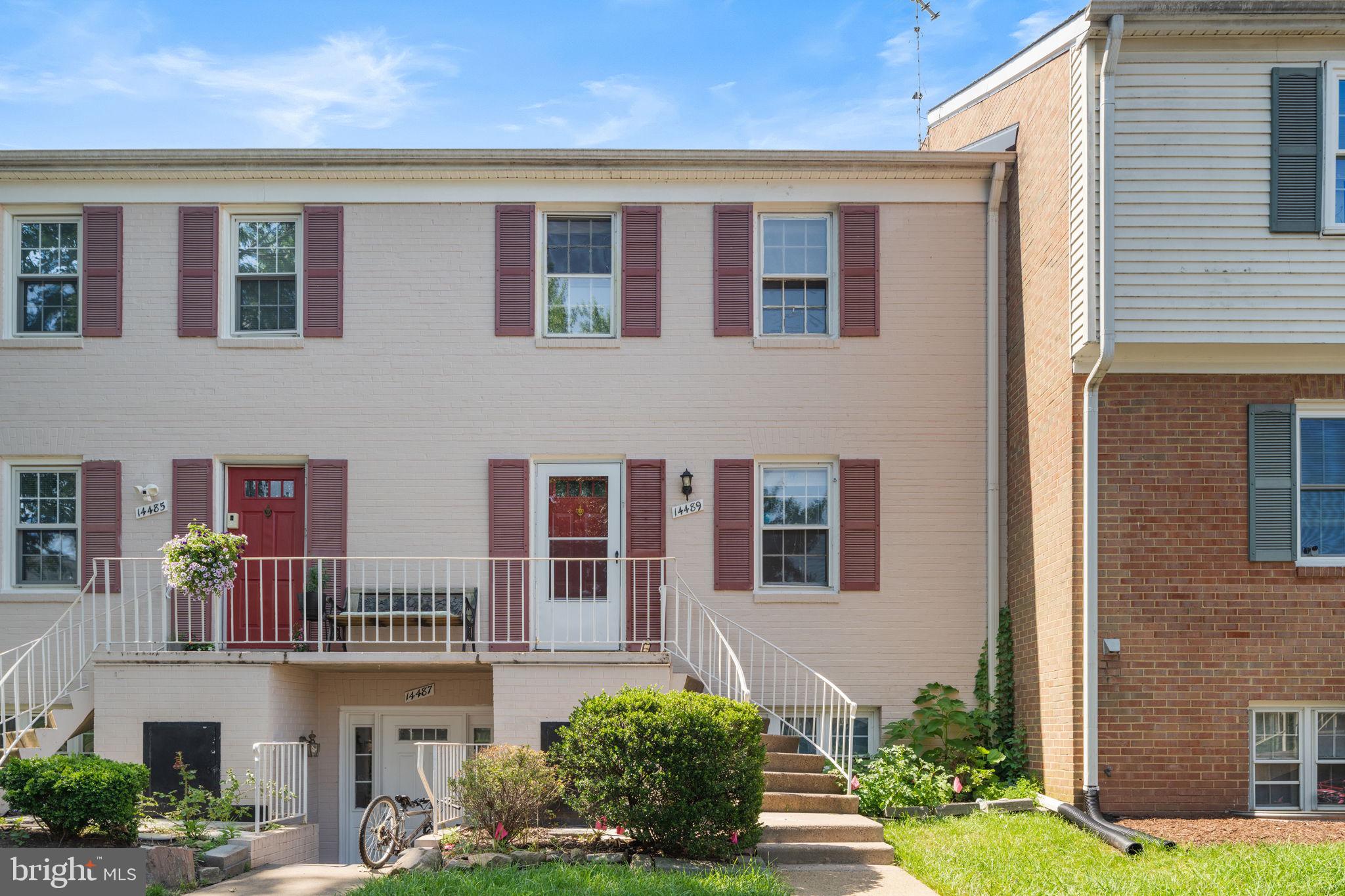14489 Golden Oak Road Centreville, VA 20121 - Photo 2 of 27 a front view of a house with garden