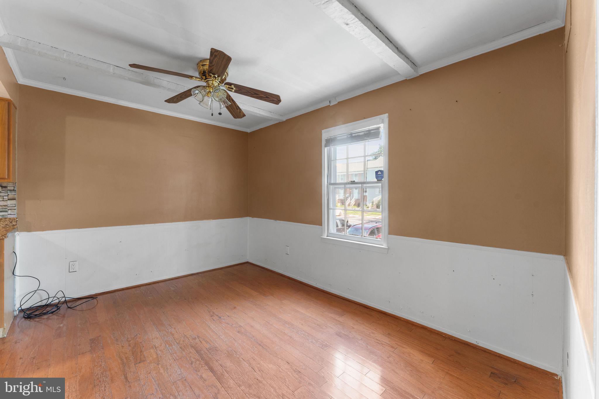 14489 Golden Oak Road Centreville, VA 20121 - Photo 6 of 27 an empty room with windows and fan