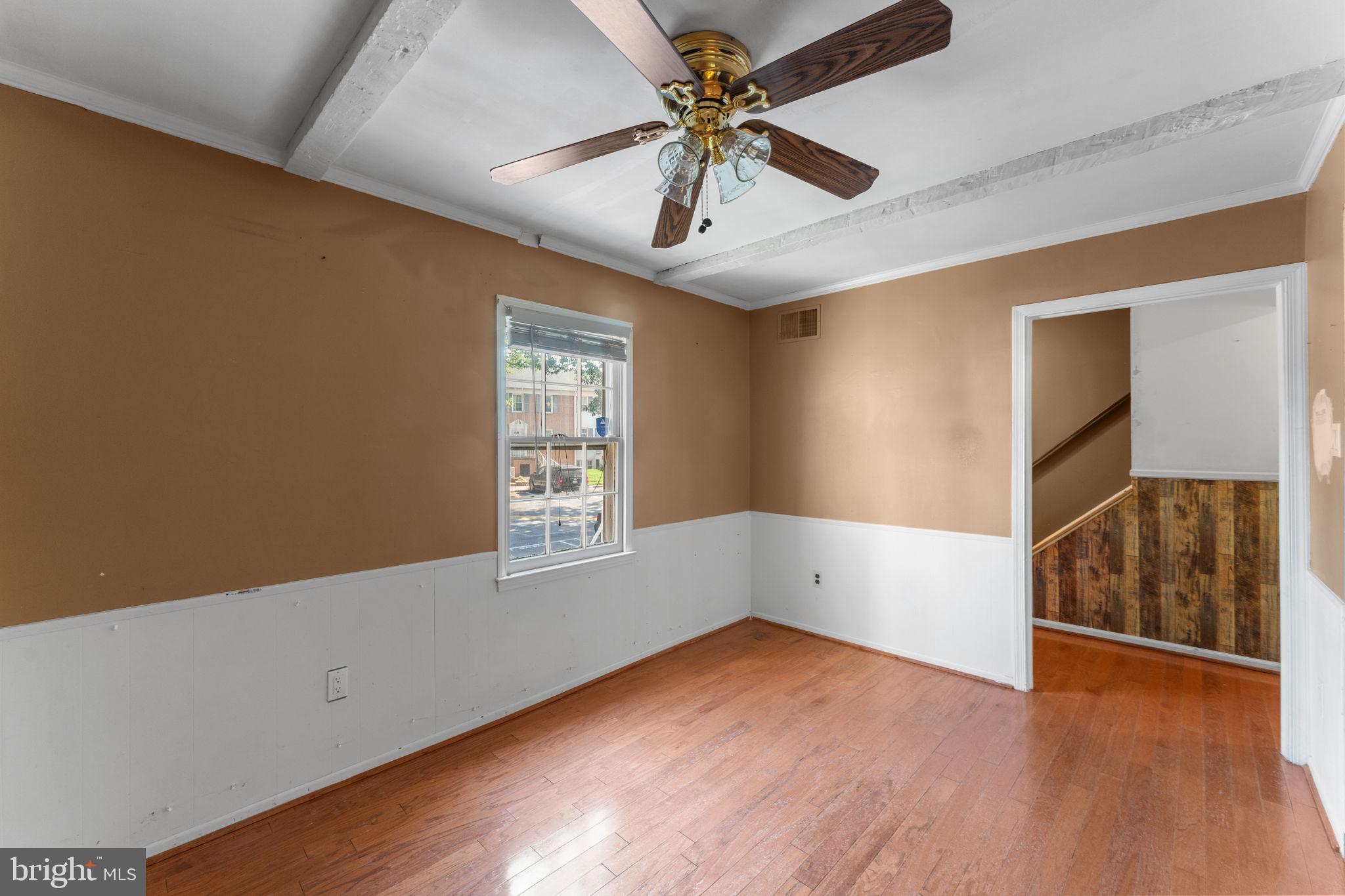 14489 Golden Oak Road Centreville, VA 20121 - Photo 7 of 27 wooden floor in an empty room with a window
