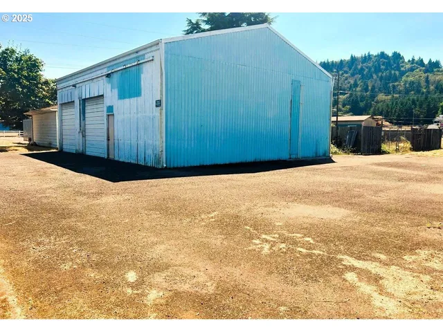 a house with a swimming pool in front of it