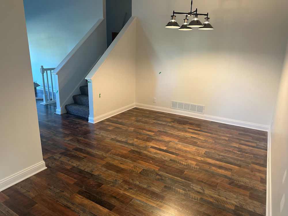 1246 Springdale Drive Rochelle, IL 61068 - Photo 5 of 9 wooden floor in an empty room with a window