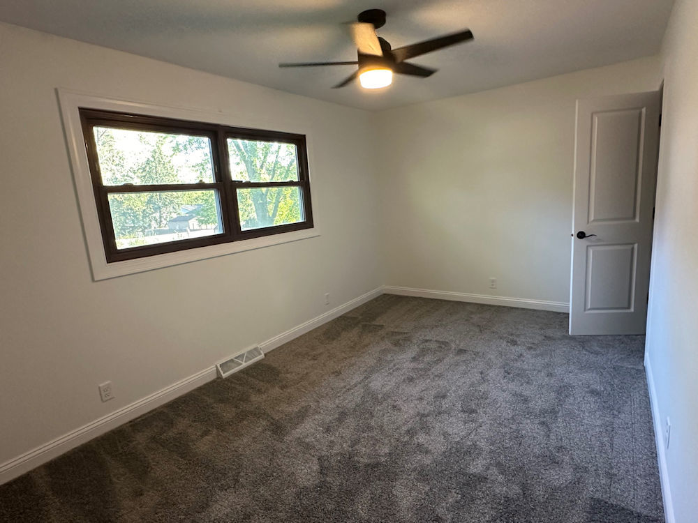 1246 Springdale Drive Rochelle, IL 61068 - Photo 8 of 9 an empty room with a window