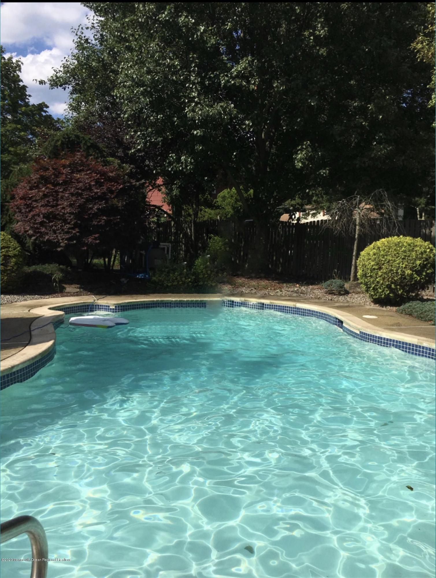 4 Canadian Woods Road Marlboro, NJ 07746 - Photo 26 of 33 a view of a backyard
