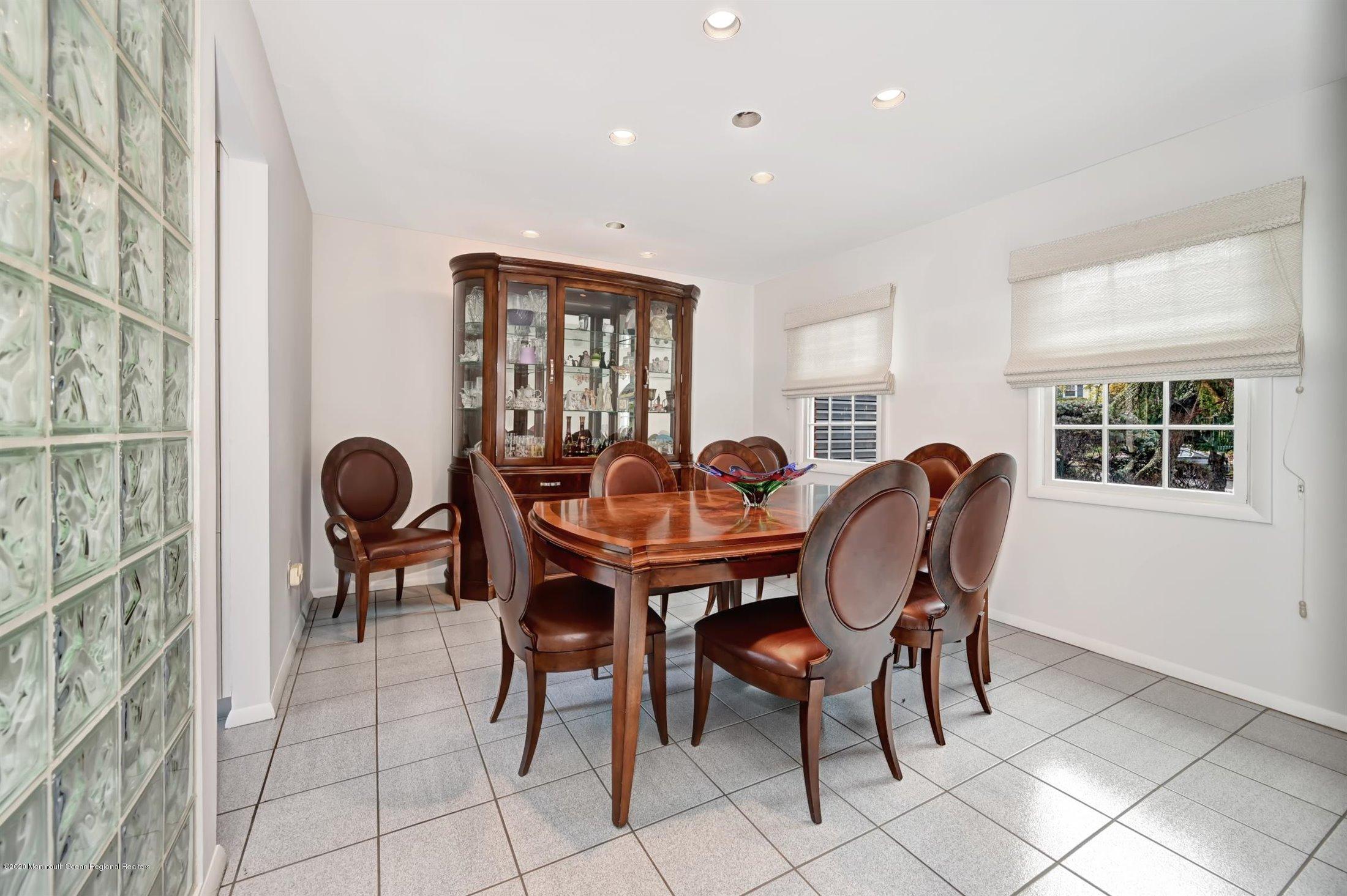 4 Canadian Woods Road Marlboro, NJ 07746 - Photo 4 of 33 a view of a dining room with furniture and window