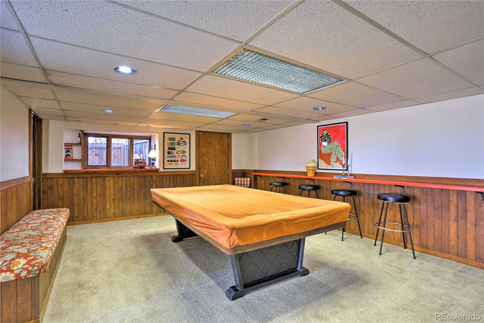 4452 South Xeric Way Denver, CO 80237 - Photo 28 of 40 a room with pool table and windows