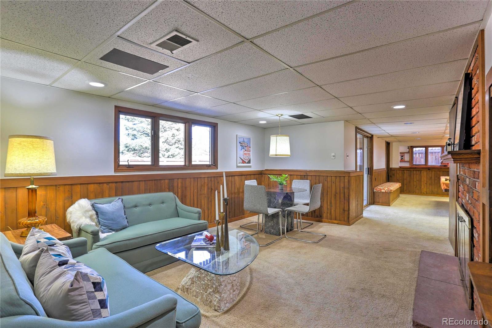 4452 South Xeric Way Denver, CO 80237 - Photo 31 of 40 a living room with furniture and a wooden floor