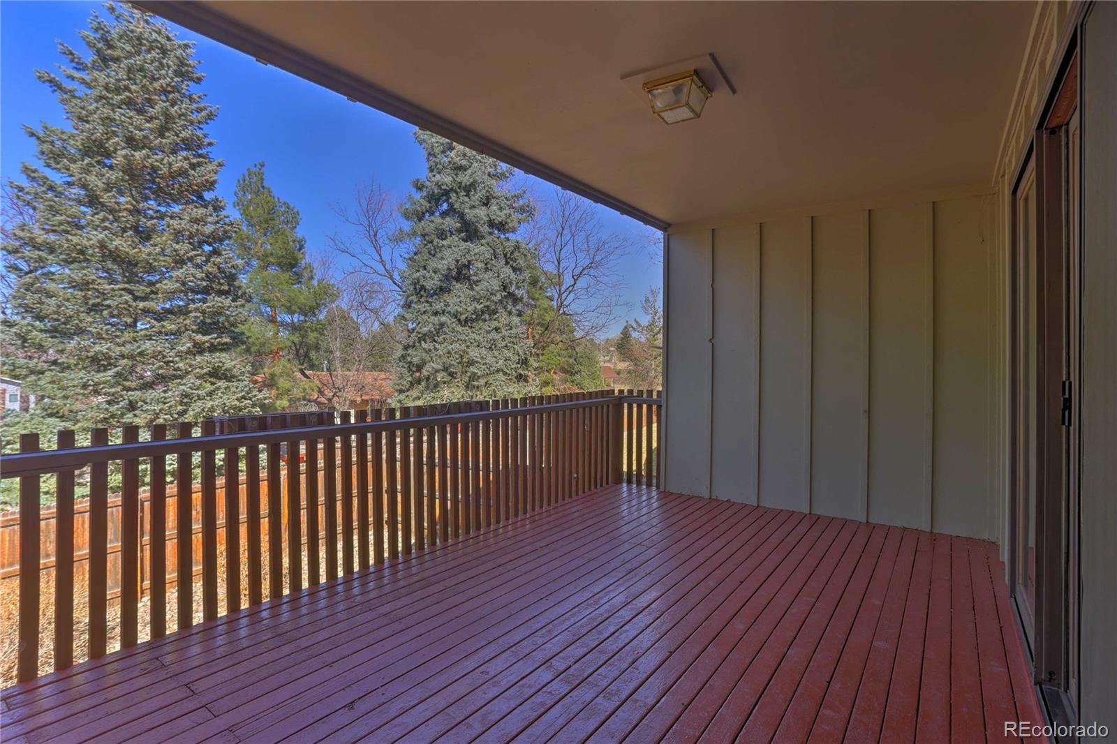 4452 South Xeric Way Denver, CO 80237 - Photo 38 of 40 a view of a balcony with wooden floor