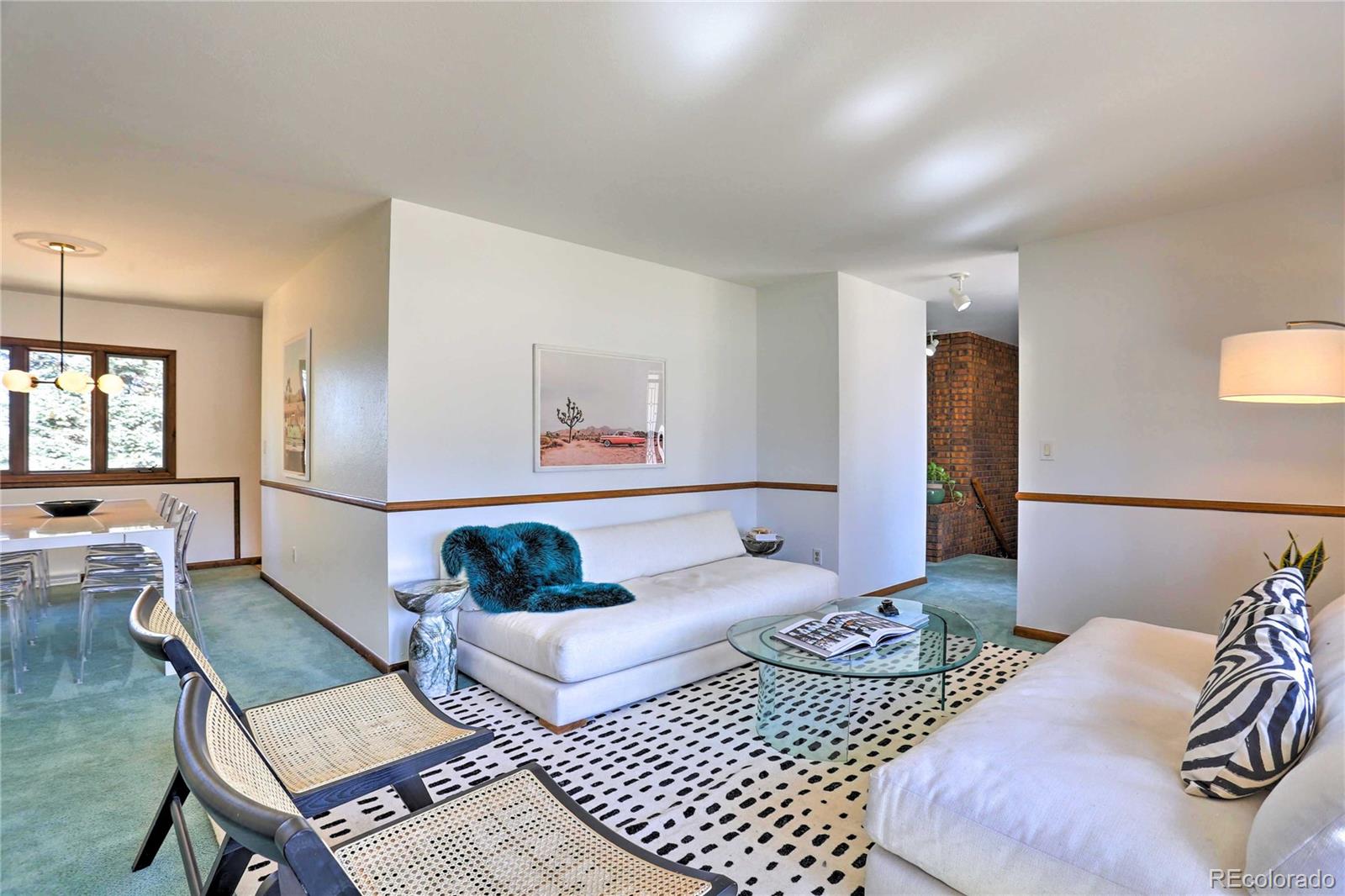 4452 South Xeric Way Denver, CO 80237 - Photo 6 of 40 a living room with furniture