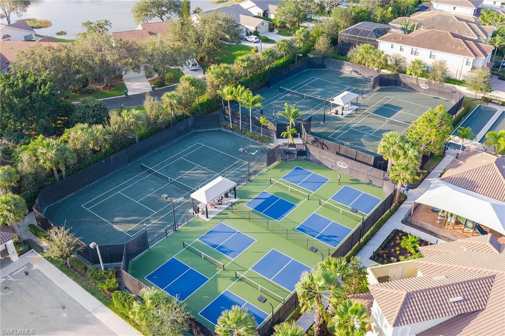 13338 Coronado Drive Naples, FL 34109 - Photo 21 of 22 a view of yard from deck with patio