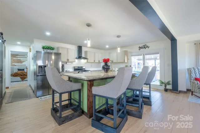 a view of a dining room with furniture