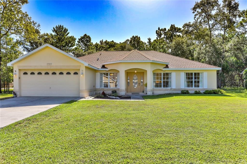 12328 Indigo Bunting Road Weeki Wachee, FL 34614 - Photo 1 of 1 Front Exterior