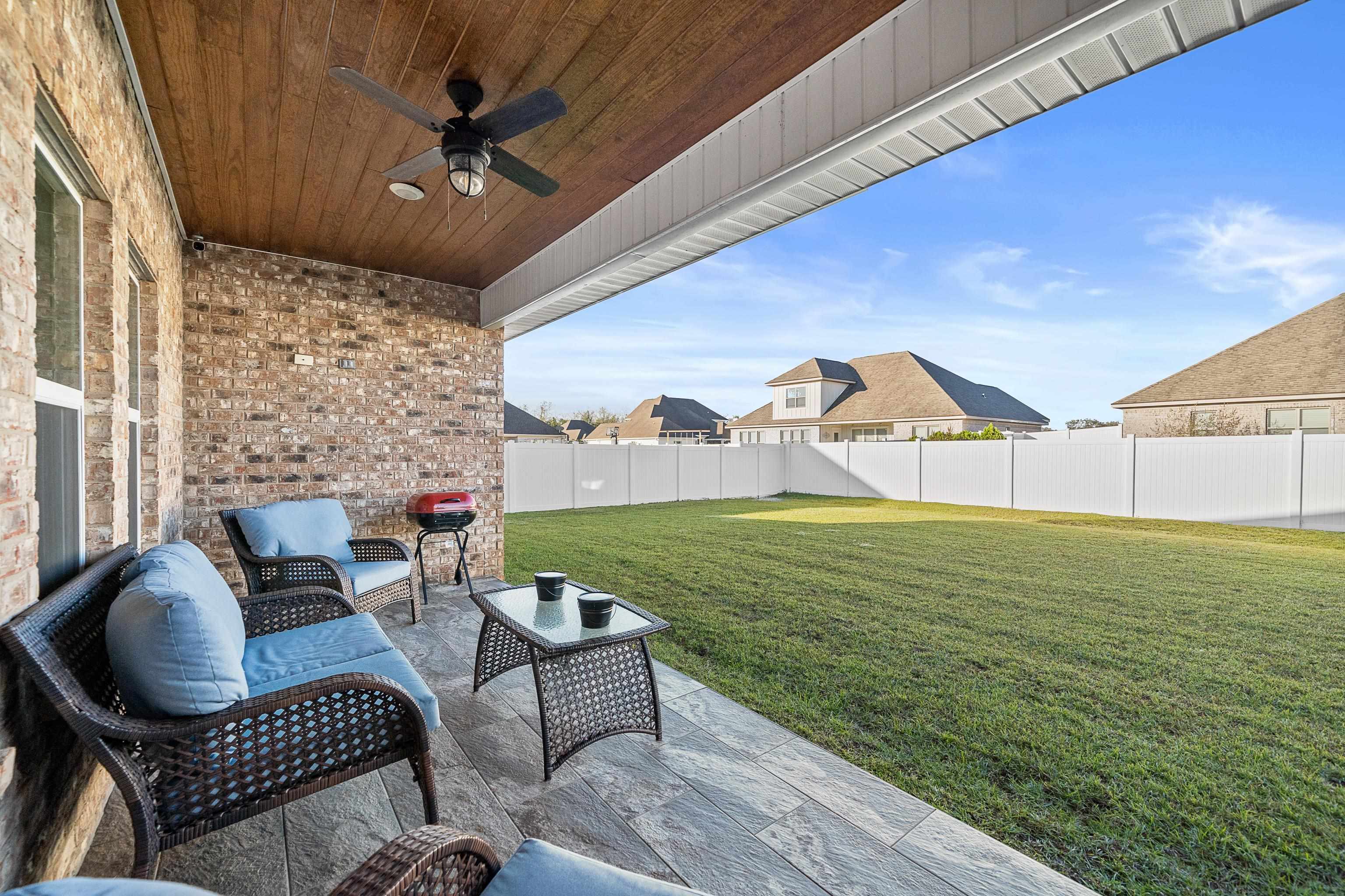 24966 Spectacular Bid Loop Daphne, AL 36526 - Photo 22 of 48 Patio with Toungue and Groove