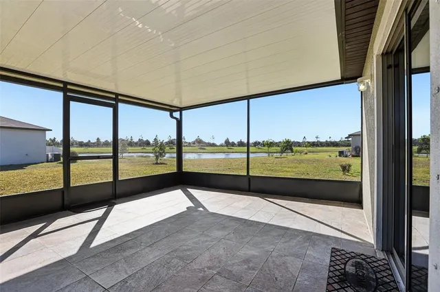 a view of an outdoor space and floor to ceiling window