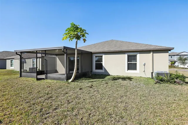 a house with trees in the background