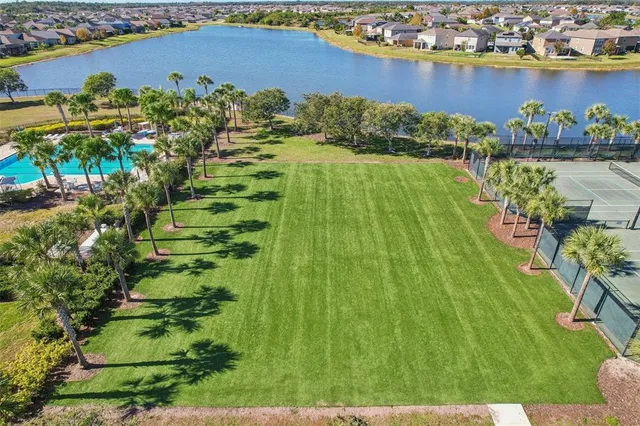 a view of a lake with a building in the background
