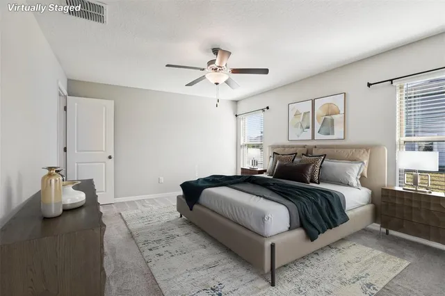 a bedroom with a bed and window