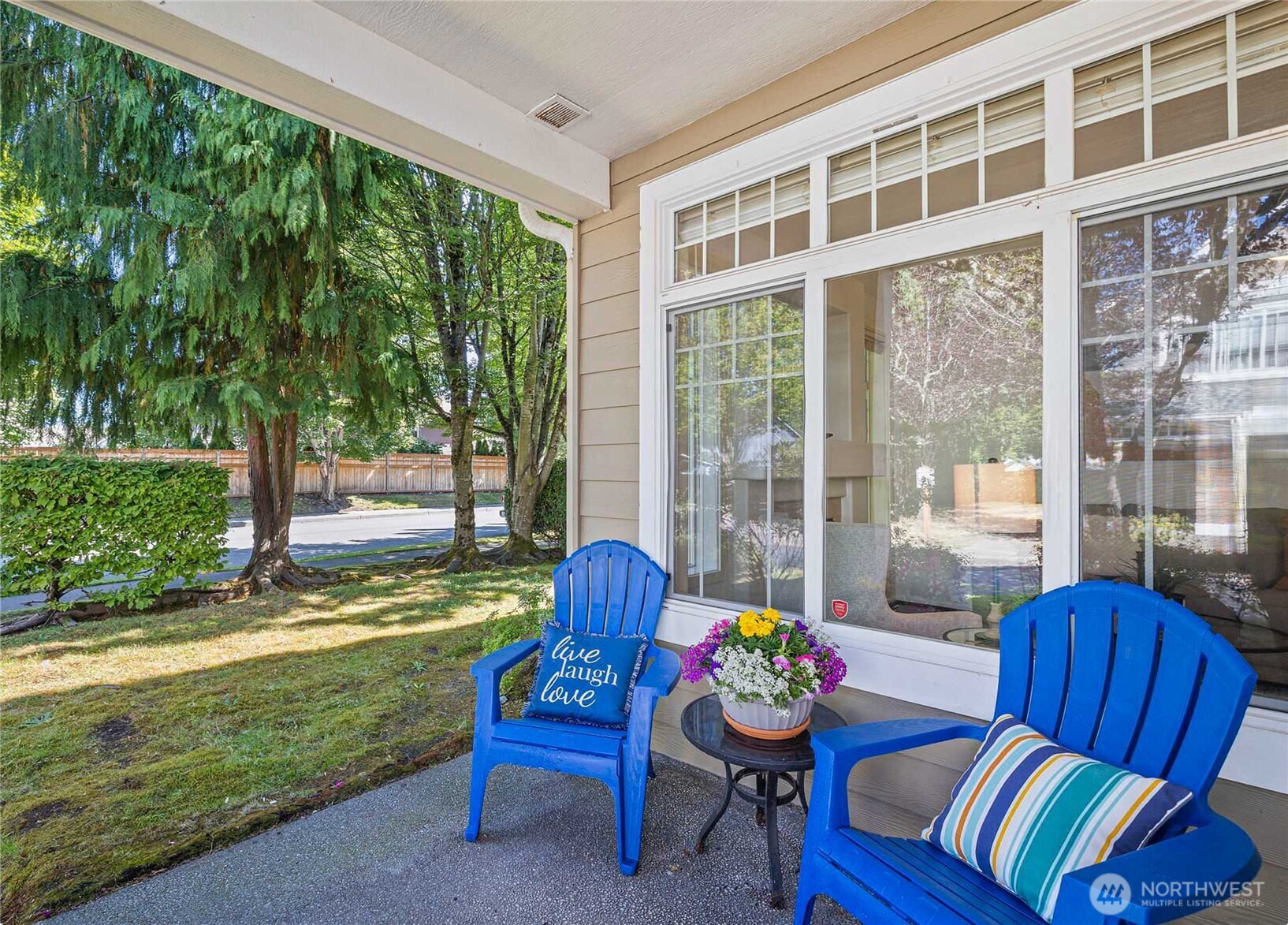 4310 Northeast 5th Court, Unit 101 Renton, WA 98059 - Photo 14 of 16 a outdoor living space with furniture and garden view