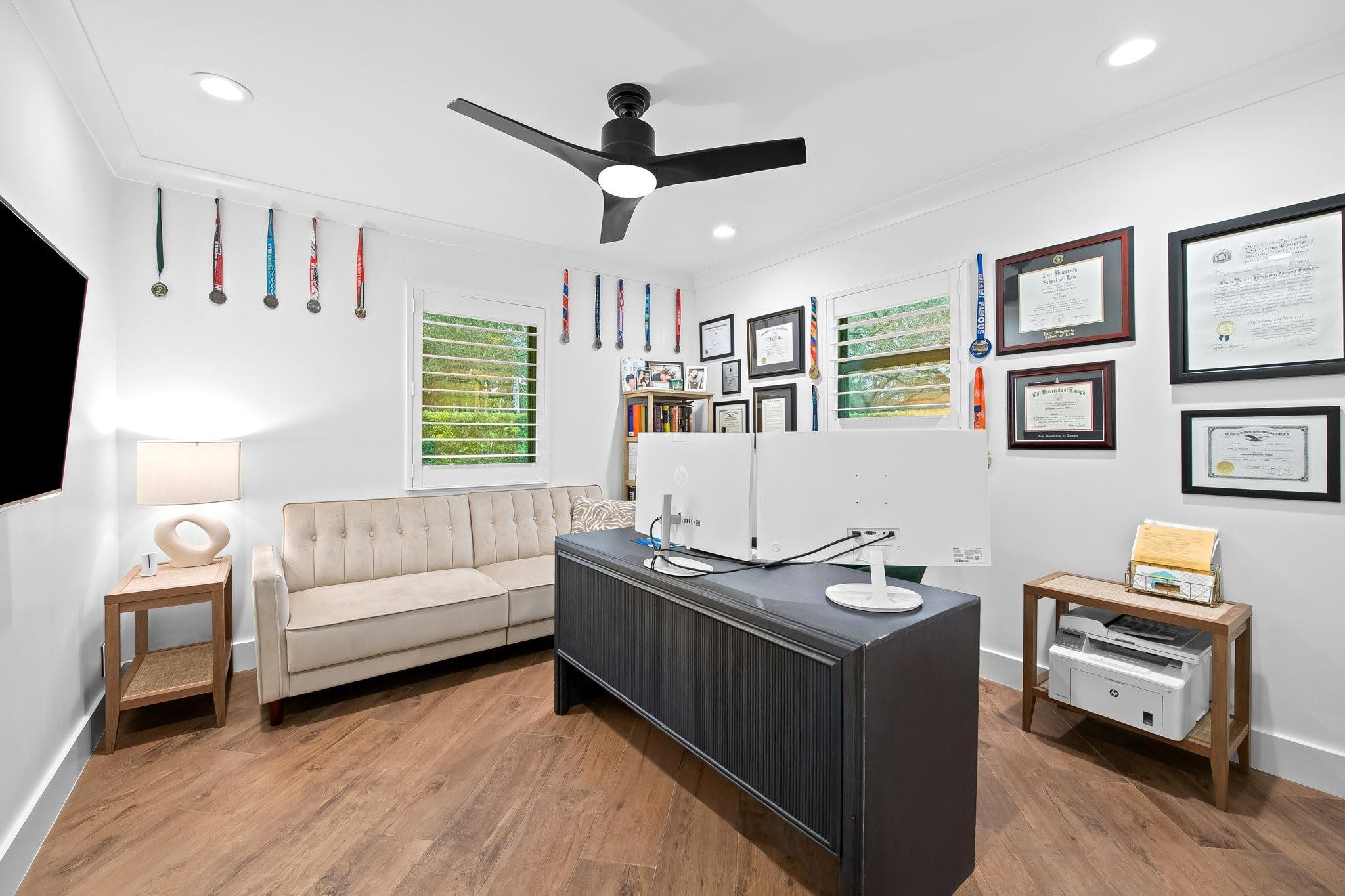 5751 Plantation Road Plantation, FL 33317 - Photo 20 of 32 a living room with furniture and a flat screen tv