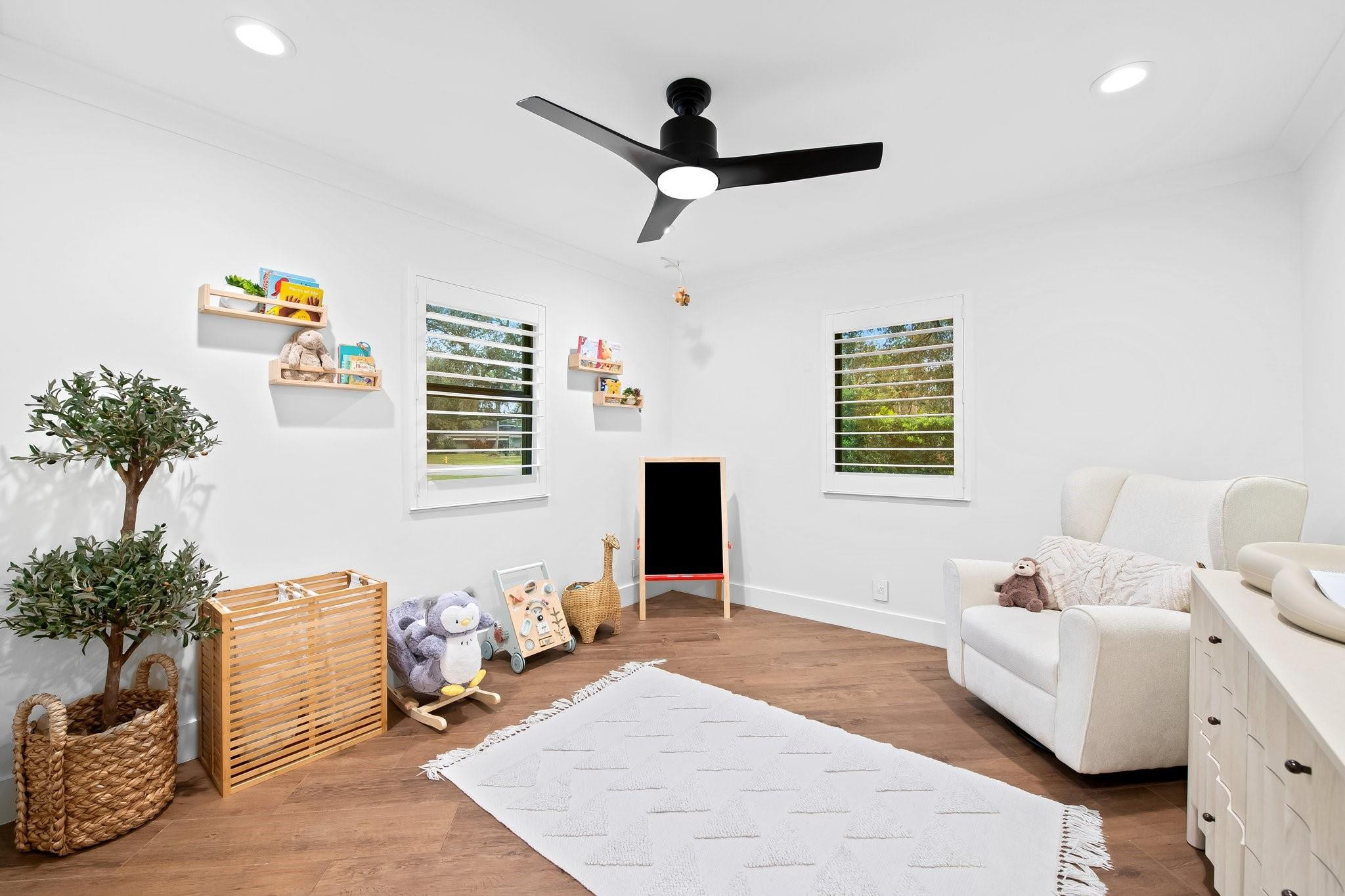 5751 Plantation Road Plantation, FL 33317 - Photo 22 of 32 a bedroom with furniture and a window