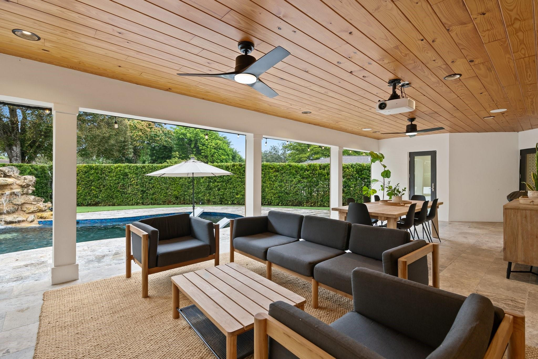 5751 Plantation Road Plantation, FL 33317 - Photo 25 of 32 a outdoor living space with patio furniture and a garden