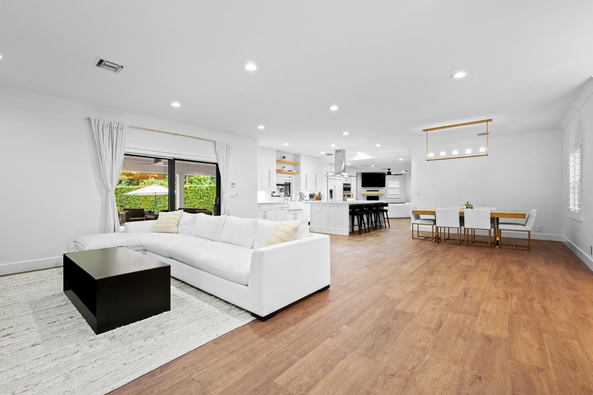 5751 Plantation Road Plantation, FL 33317 - Photo 6 of 32 a living room with furniture and a wooden floor