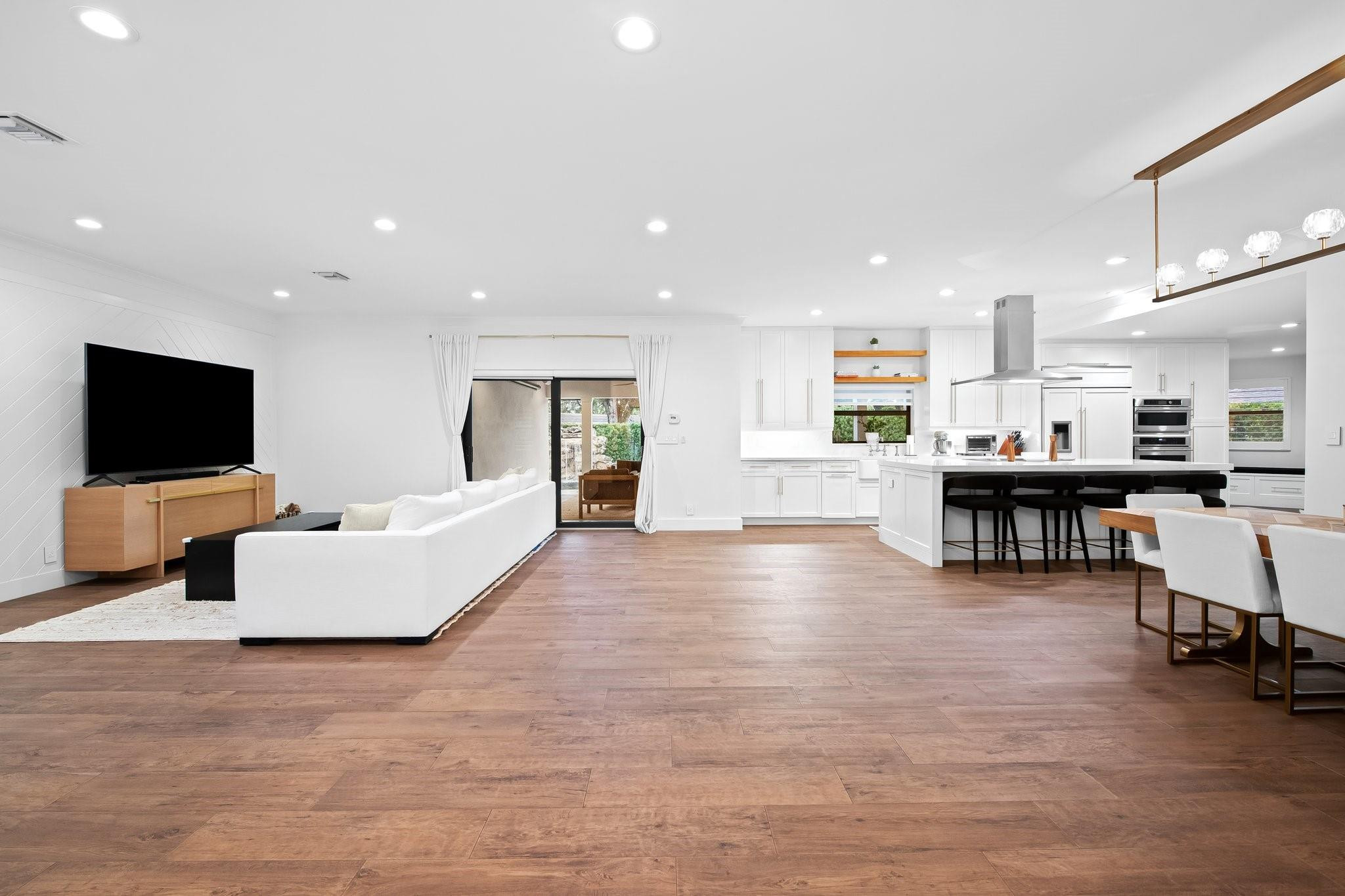5751 Plantation Road Plantation, FL 33317 - Photo 7 of 32 a living room with furniture and a flat screen tv
