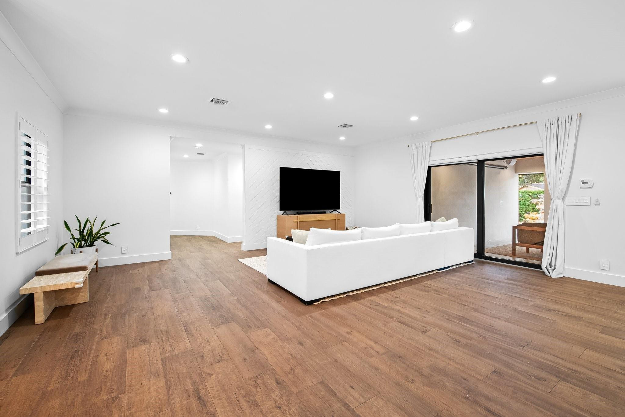 5751 Plantation Road Plantation, FL 33317 - Photo 8 of 32 a living room with furniture and a flat screen tv