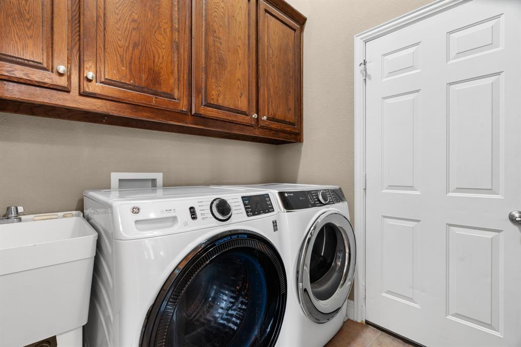112 Waterfall Court Azle, TX 76020 - Photo 16 of 40 Gotta love a laundry room sink!!