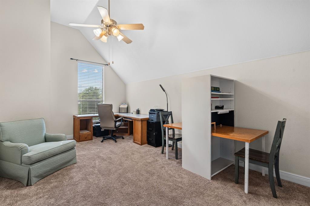 112 Waterfall Court Azle, TX 76020 - Photo 25 of 40 This is the LARGE second primary bedroom upstairs that has a full bath just outside the door.