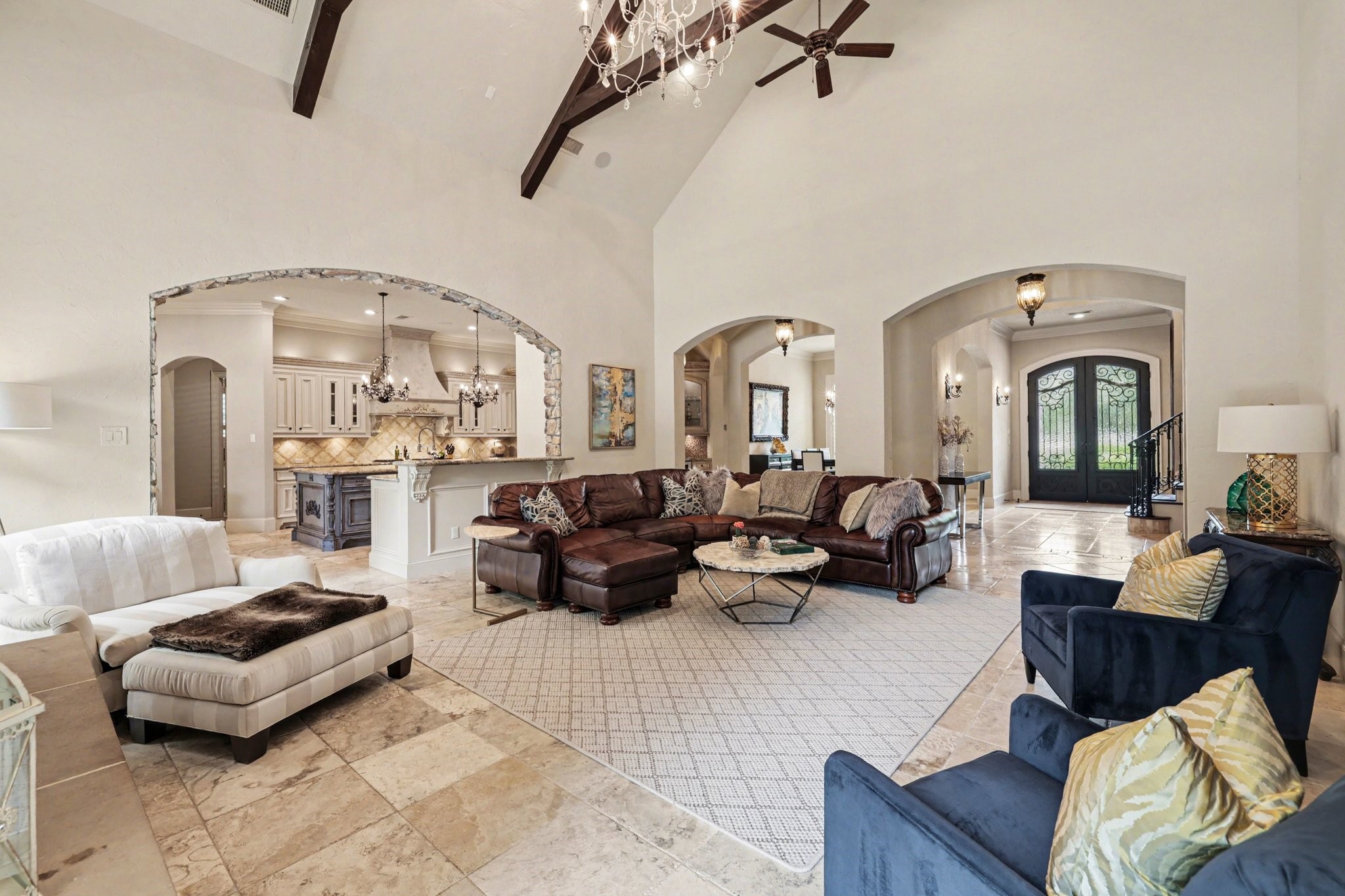 3 Player Ridge Court The Woodlands, TX 77382 - Photo 11 of 50 This expansive living room seamlessly flows into the kitchen.