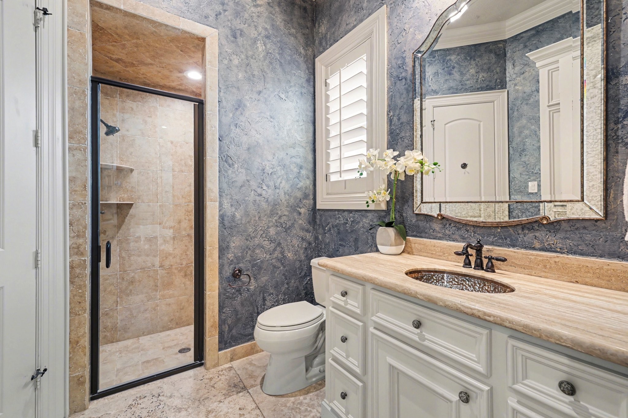3 Player Ridge Court The Woodlands, TX 77382 - Photo 21 of 50 View of the downstairs secondary bedroom with a glass standing shower.