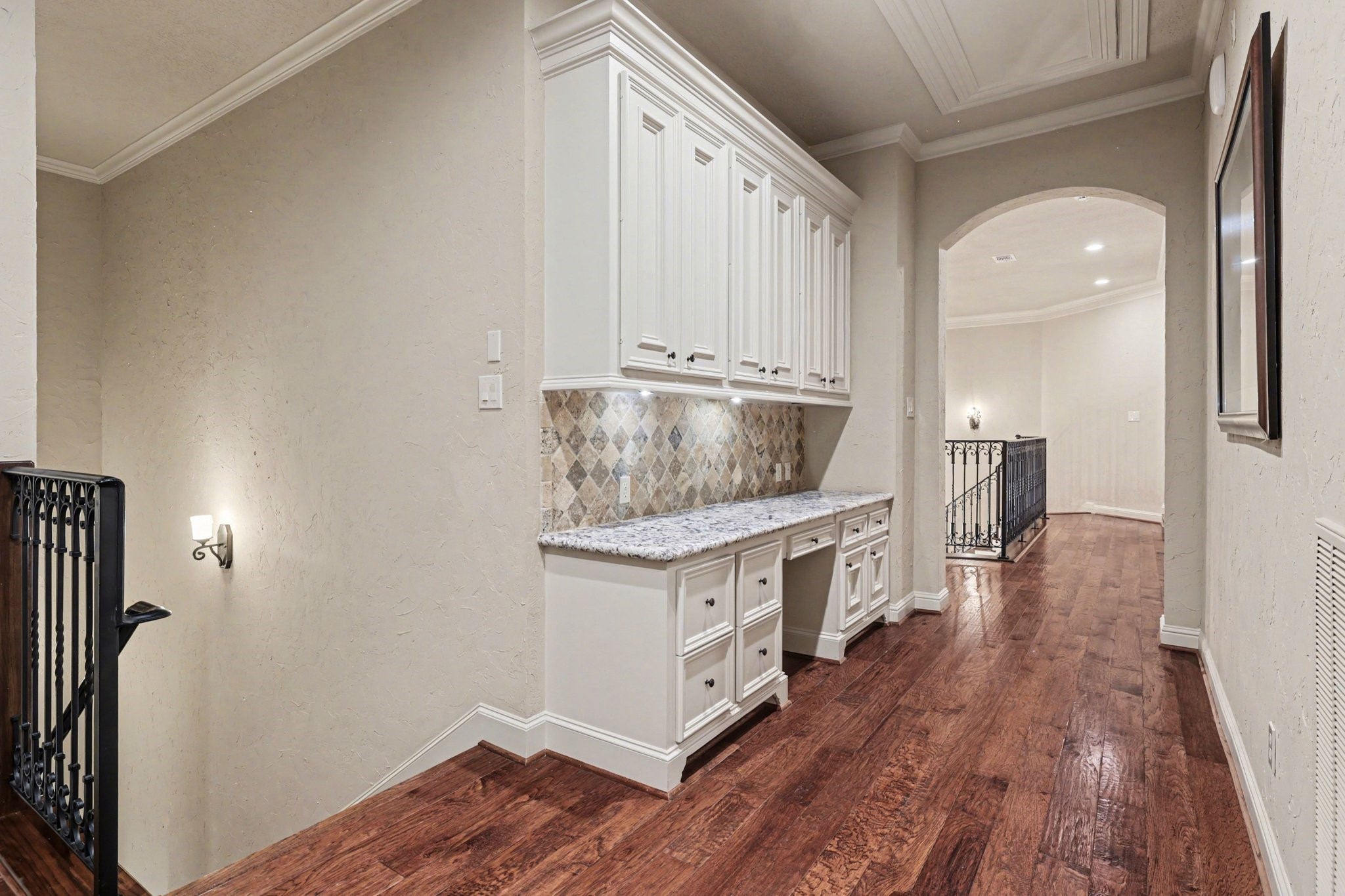 3 Player Ridge Court The Woodlands, TX 77382 - Photo 24 of 50 Upstairs study nook featuring built-in cabinetry and generous counter space.