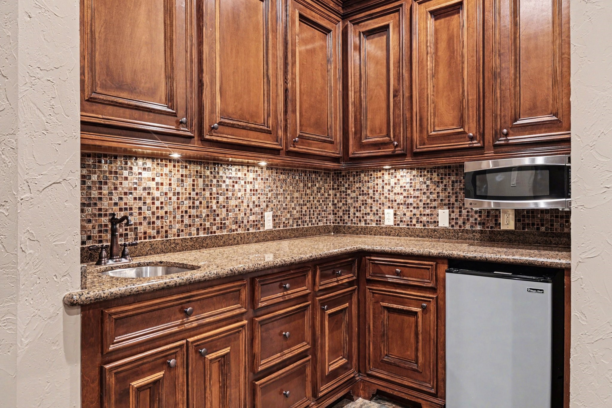 3 Player Ridge Court The Woodlands, TX 77382 - Photo 26 of 50 Closer look at the kitchenette in the media room.