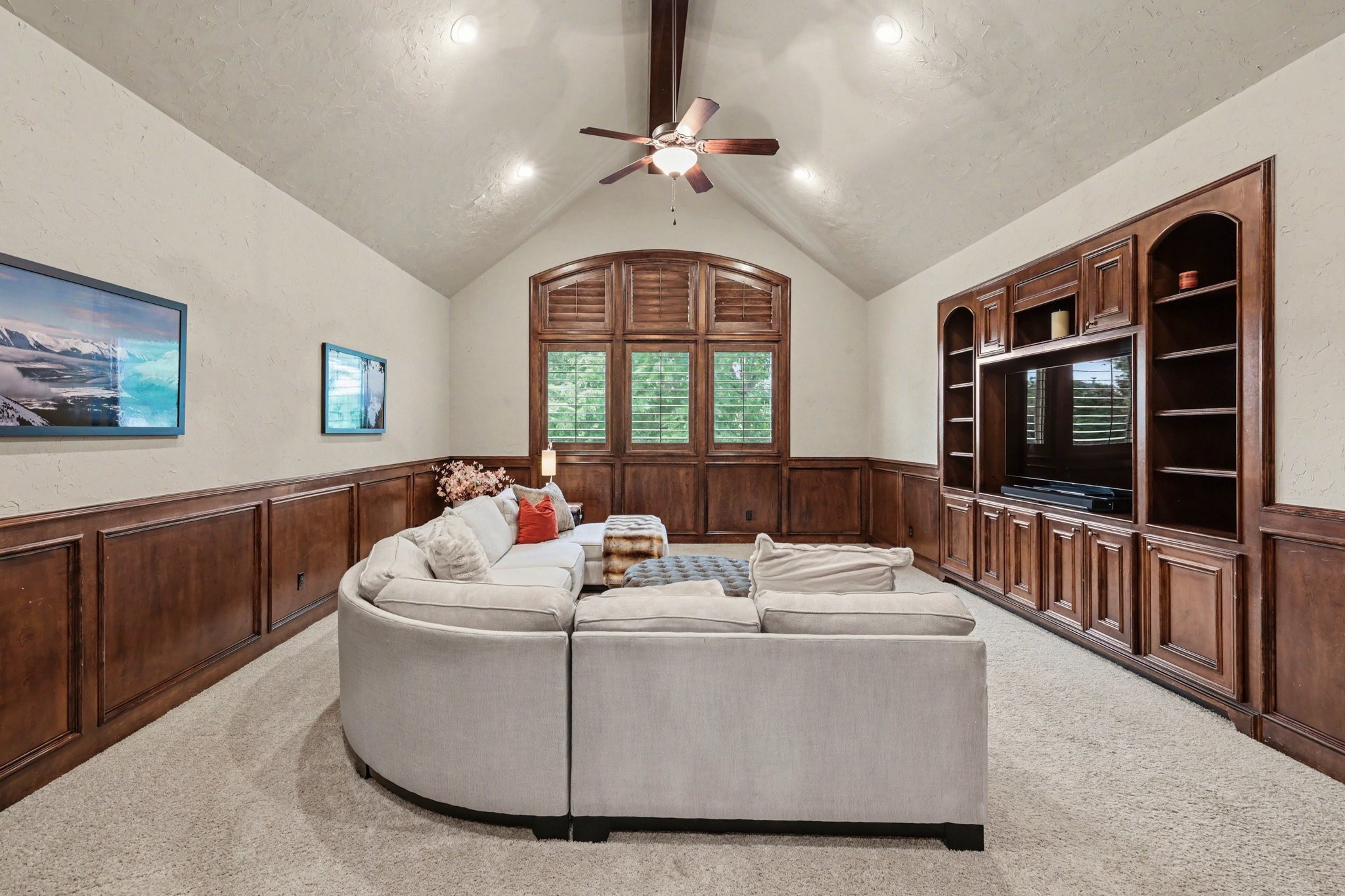 3 Player Ridge Court The Woodlands, TX 77382 - Photo 28 of 50 Well-appointed game room with built-in entertainment center and warm wood finishes.