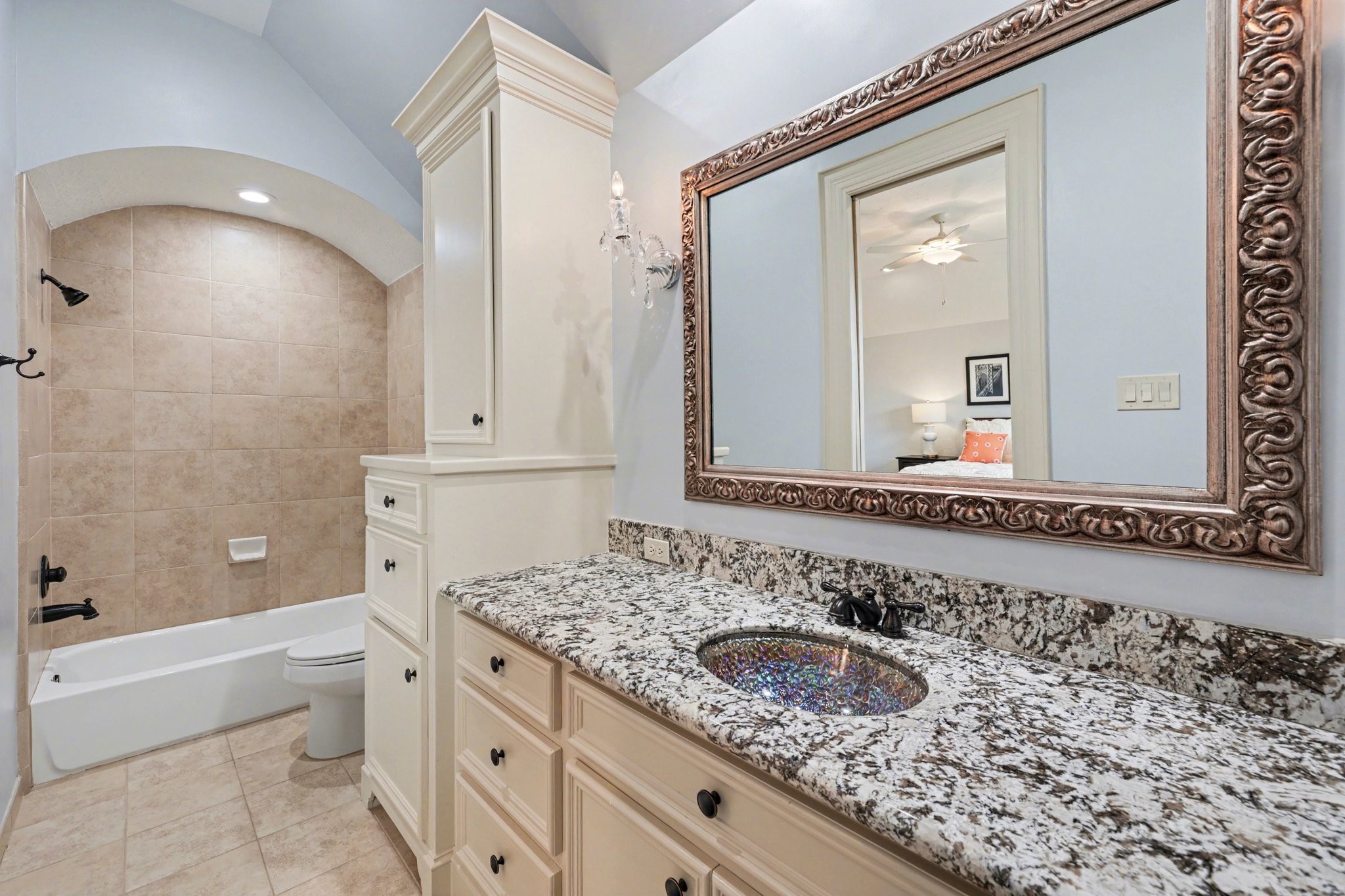 3 Player Ridge Court The Woodlands, TX 77382 - Photo 32 of 50 Lavish secondary bathroom with a combination tub and shower, tons of countertop space, and custom finishes.